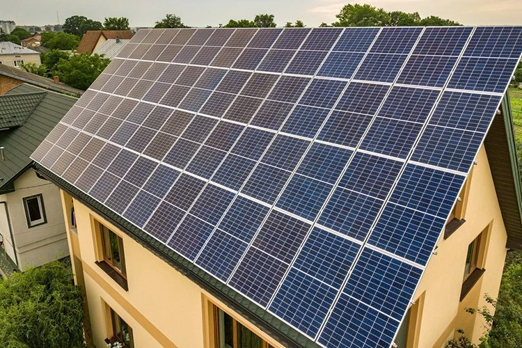 Solar panels on the roof of a house in Cairns generate solar energy.