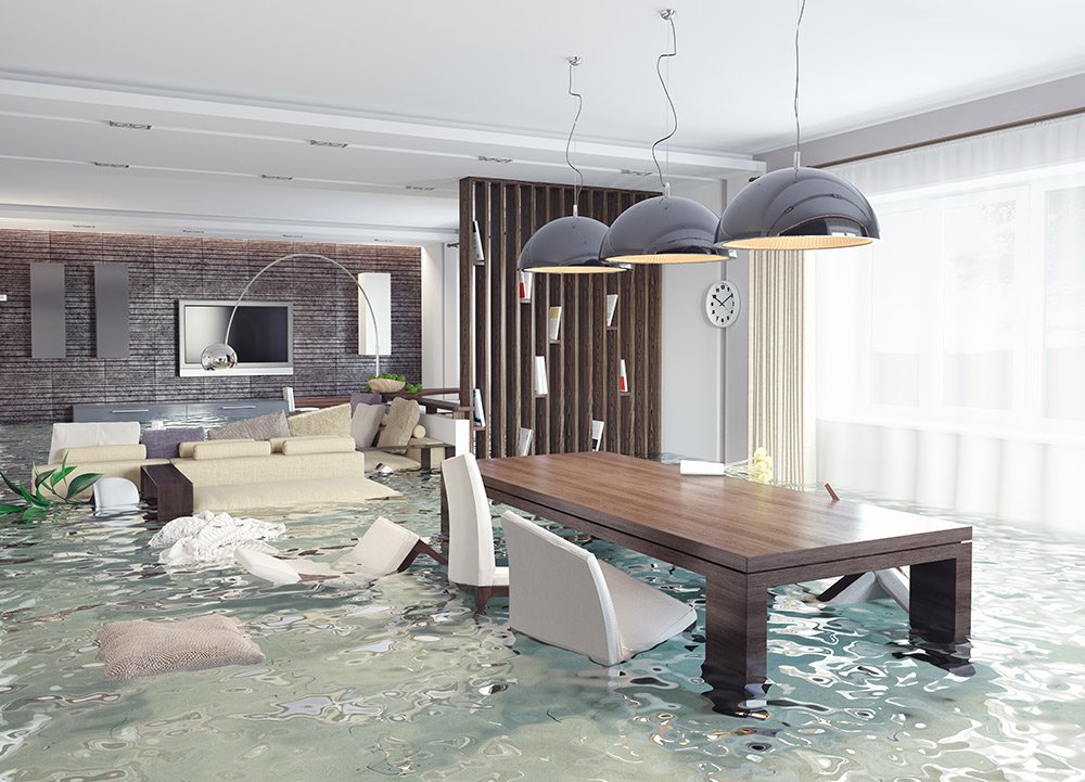 Flooded living room with furniture and a table in Cairns.