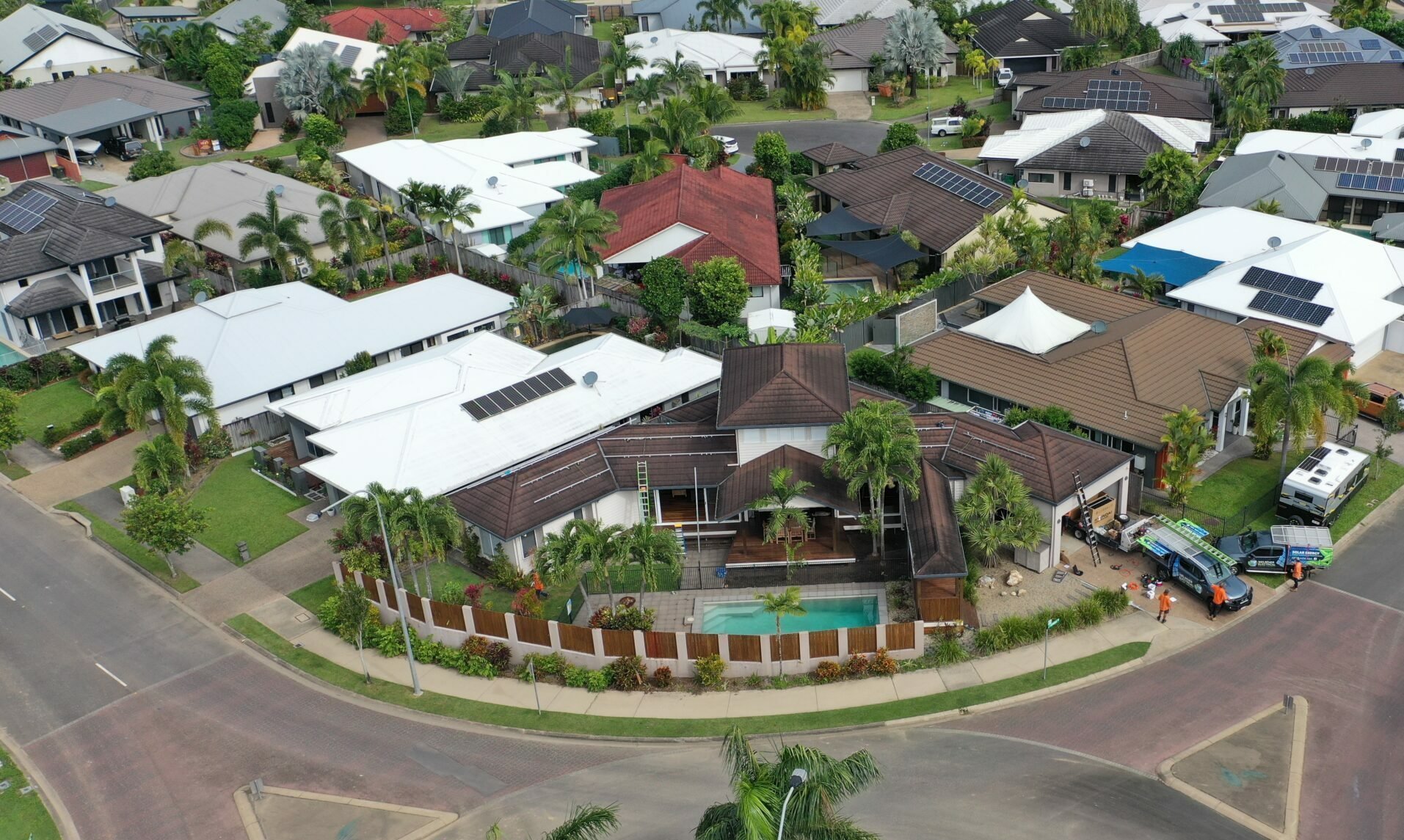 An aerial view of a residential neighborhood featuring Hielscher Electrical's innovative Solar Power solutions.